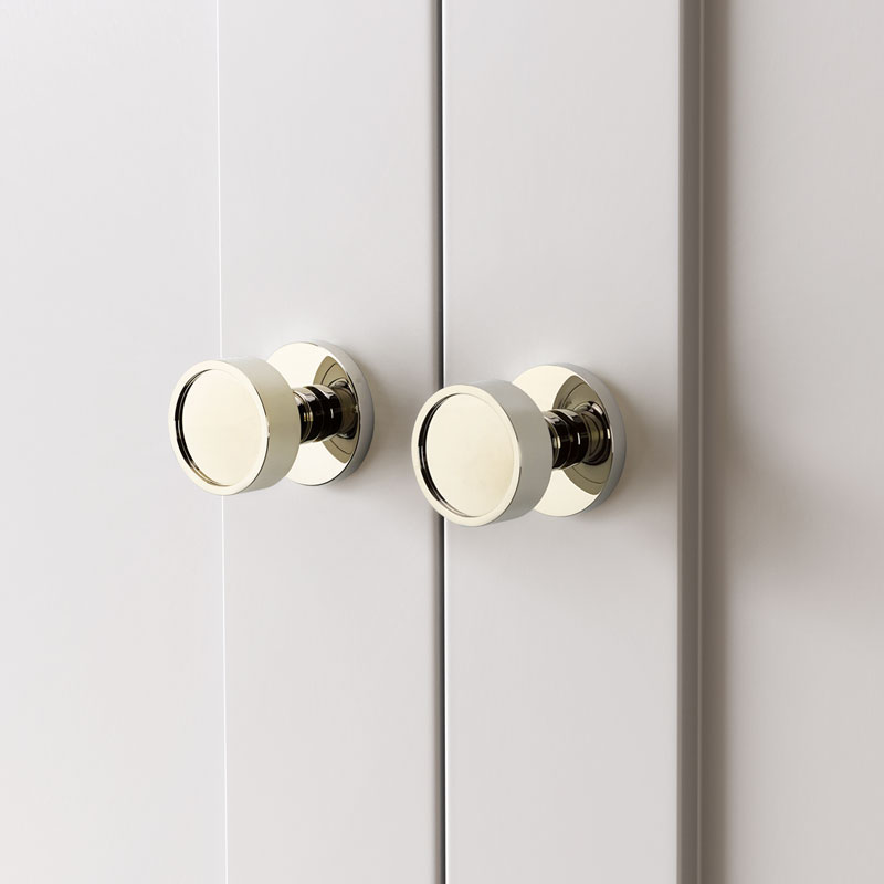 gray cabinet with silver knobs